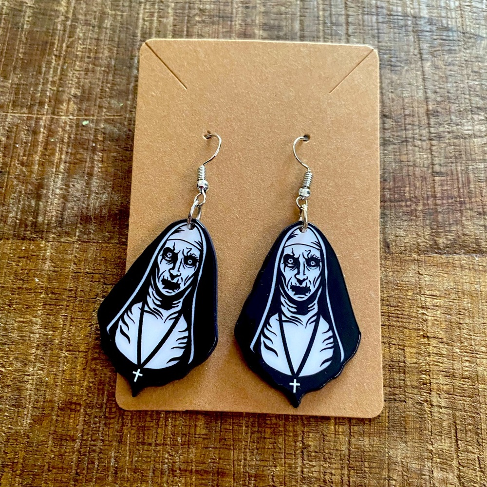 The Nun earrings.